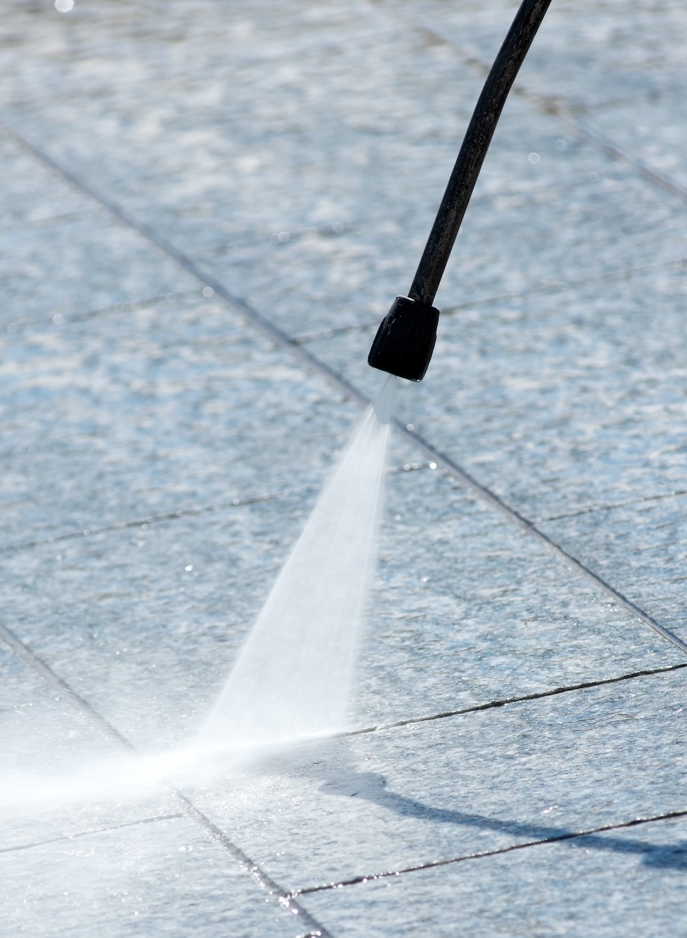 pressure hose cleaning outdoor stone paving